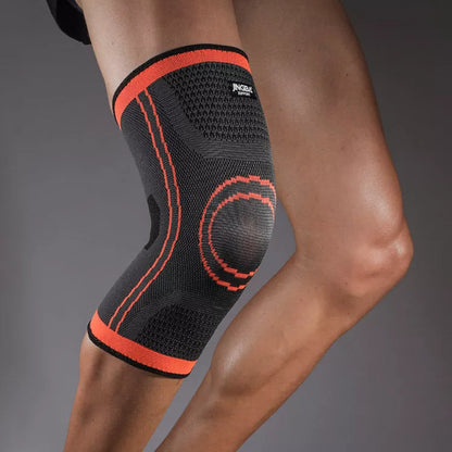 Breathable nylon knee pads for cycling and sports, available in green and orange