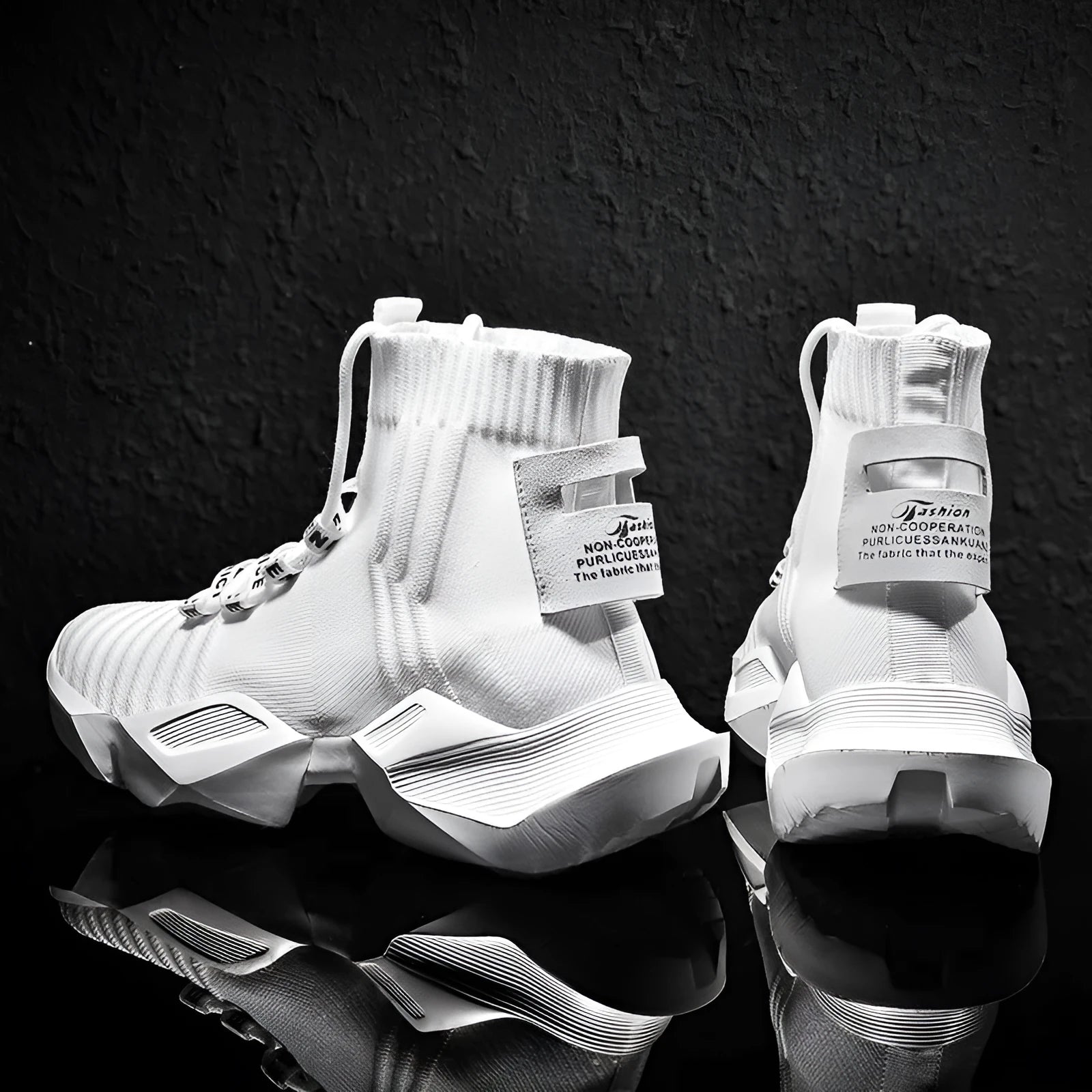 Men's black and white socks-style casual sports shoes with mesh lining, shown in large sizes.