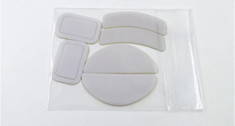White replacement mouse skates for Logitech G Pro X Superlight and G Pro Wireless mice with anti-static tweezers.