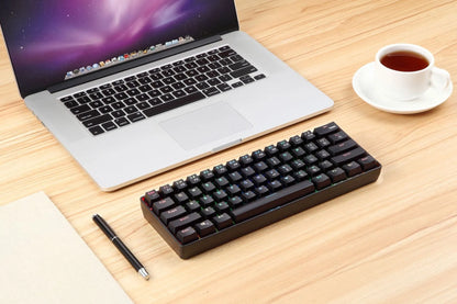 Black 61-key mechanical keyboard with RGB backlight, green axis switches, and English keycaps