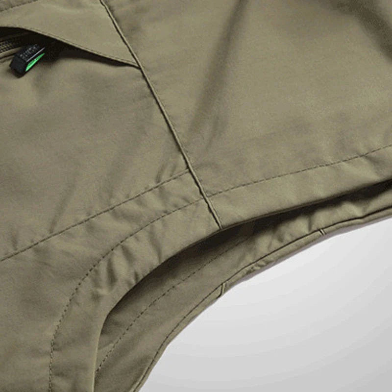 Men's Outdoor Vest in various colors, featuring a stand-up collar, zipper closure, and durable cotton-blend fabric for superior comfort and protection.