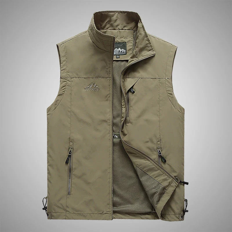 Men's Outdoor Vest in various colors, featuring a stand-up collar, zipper closure, and durable cotton-blend fabric for superior comfort and protection.