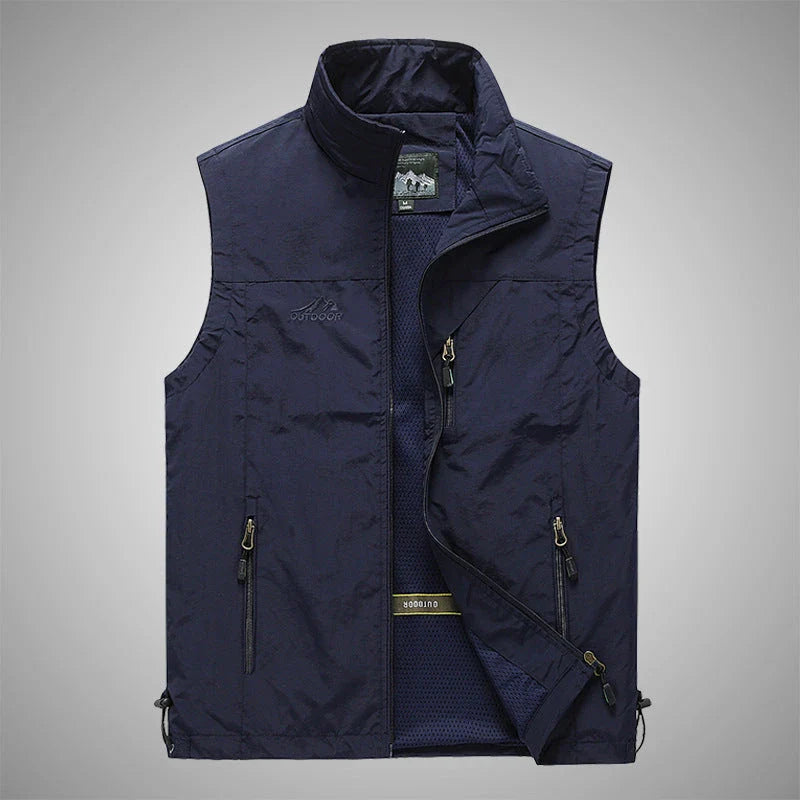 Men's Outdoor Vest in various colors, featuring a stand-up collar, zipper closure, and durable cotton-blend fabric for superior comfort and protection.