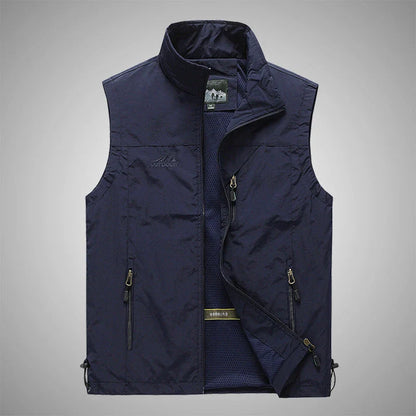 Men's Outdoor Vest in various colors, featuring a stand-up collar, zipper closure, and durable cotton-blend fabric for superior comfort and protection.