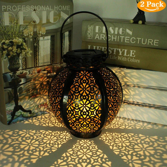 Black six-sided solar garden hanging lamp with wrought iron frame and clear glass panels