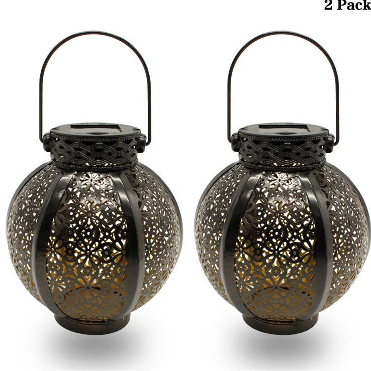 Black six-sided solar garden hanging lamp with wrought iron frame and clear glass panels