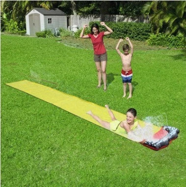 Inflatable water park with spray feature and water slide for children's outdoor play