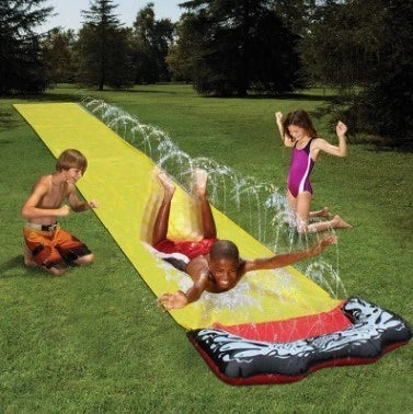 Inflatable water park with spray feature and water slide for children's outdoor play