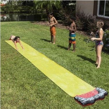 Inflatable water park with spray feature and water slide for children's outdoor play