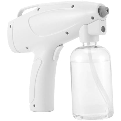White cordless handheld electric spray gun with bottle, showing mist spray and USB Type-C charging port.