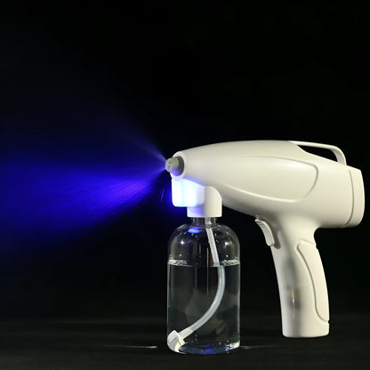 White handheld cordless electric spray gun with USB Type-C charging port and trigger.