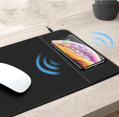 Wireless charging mouse pad showing 298x215mm surface with smartphone charging on integrated Qi pad