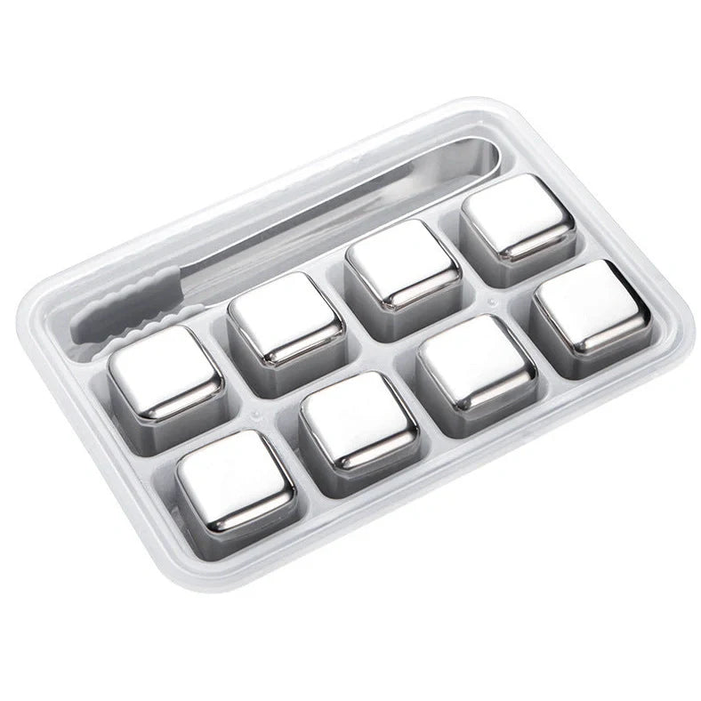 Stainless steel ice cubes in gold and silver finishes with tongs for chilling drinks without dilution