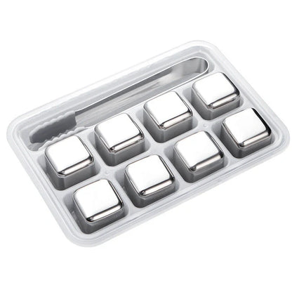 Stainless steel ice cubes in gold and silver finishes with tongs for chilling drinks without dilution