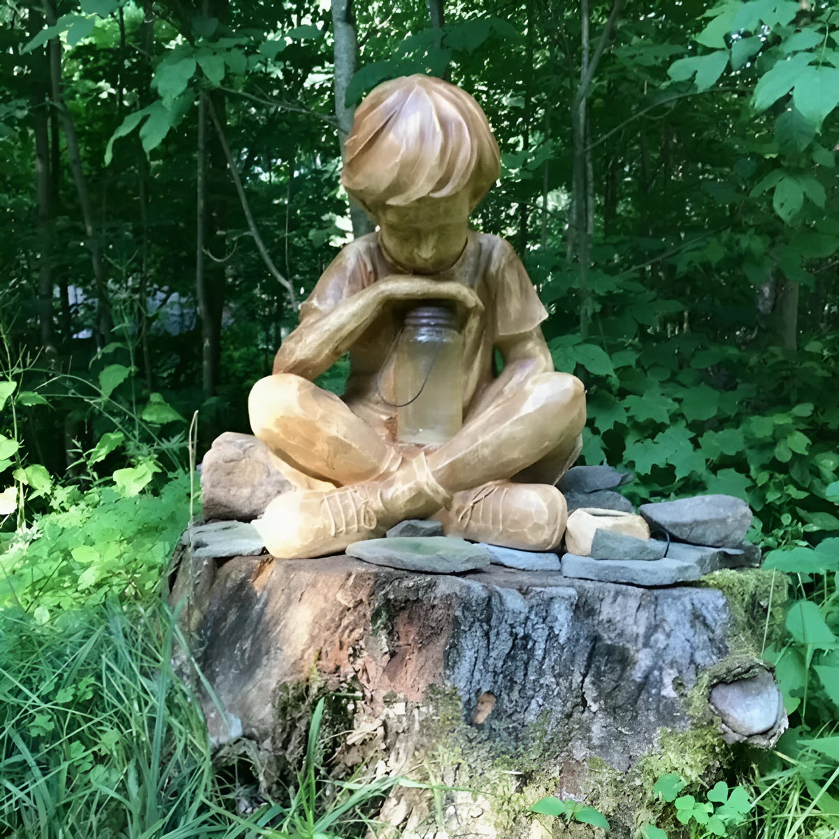 Brown natural resin tabletop ornament with little boy design from The Boy In The Garden