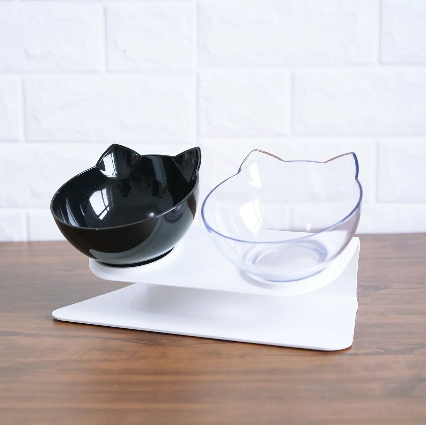 Transparent plastic double bowl for cats with separate food and water compartments