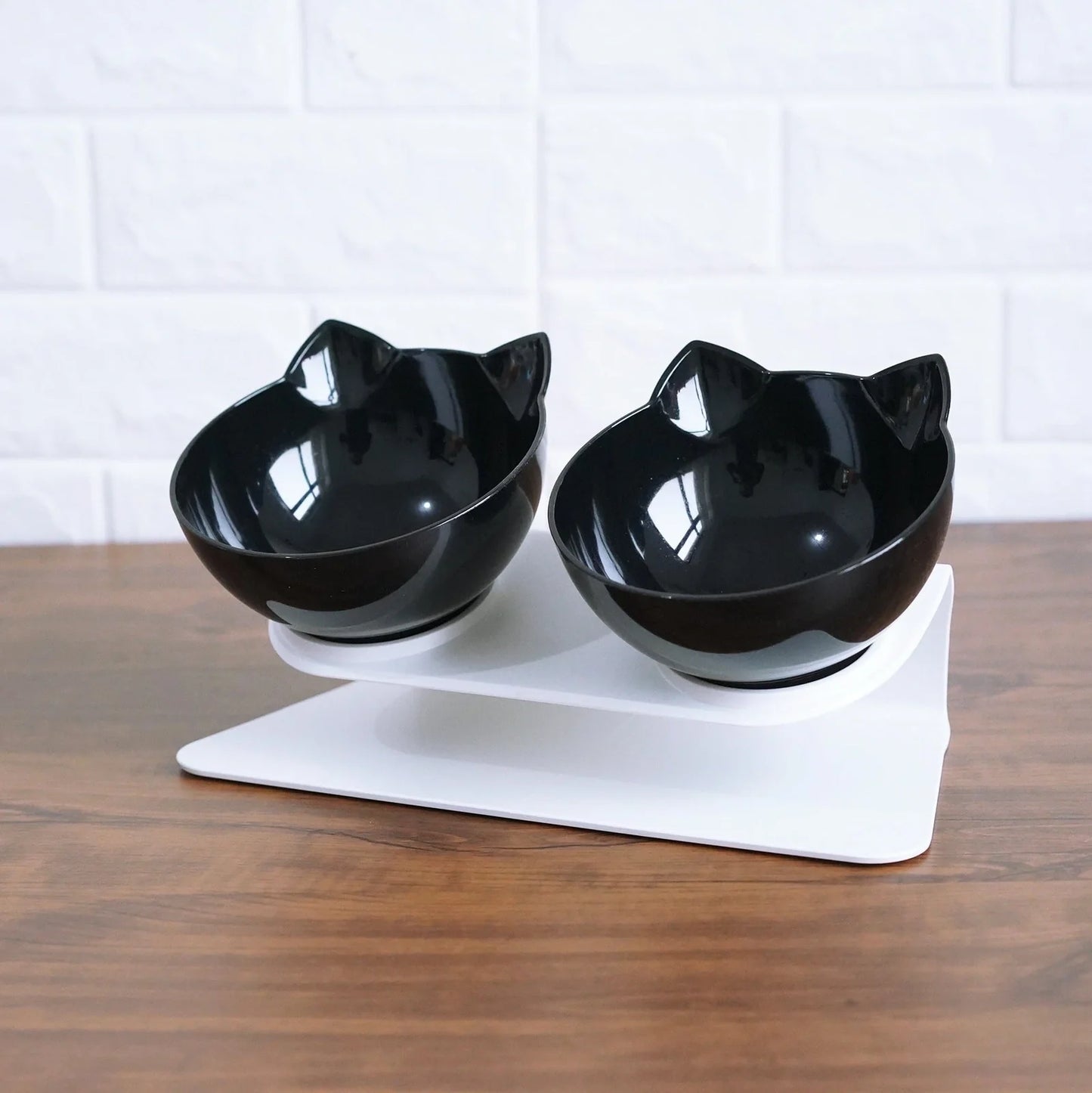 Transparent plastic double bowl for cats with separate food and water compartments