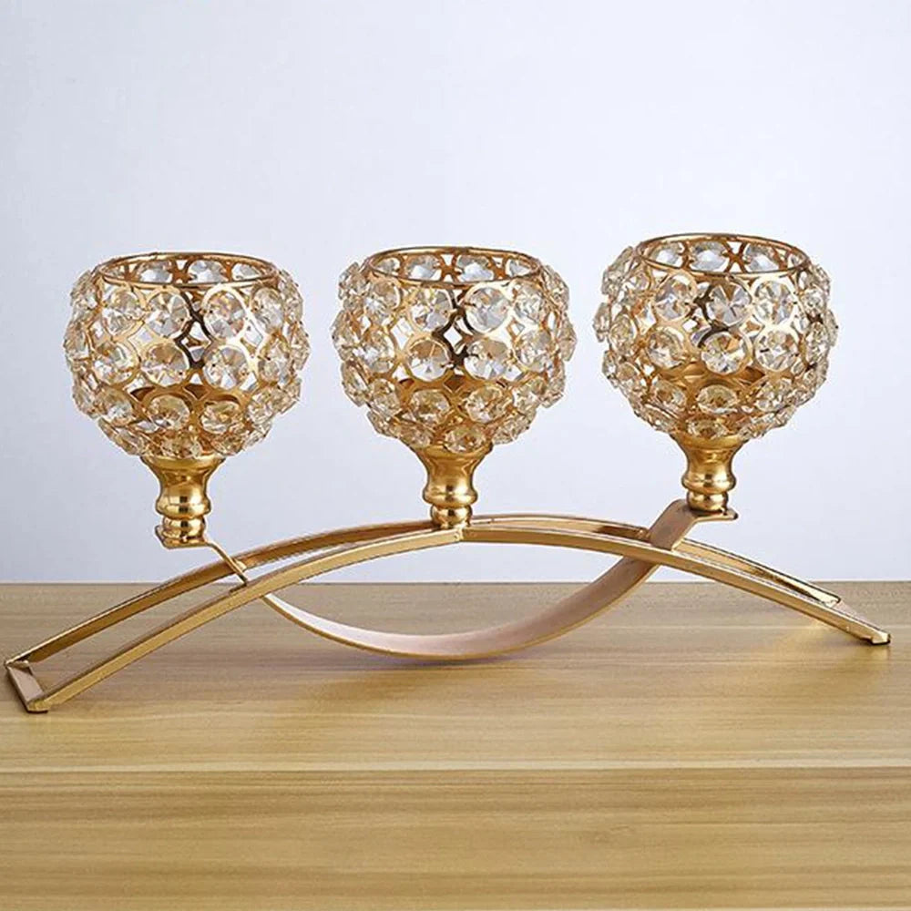 Geometric wrought iron candle holder with crystal centre in gold or silver electroplated finish