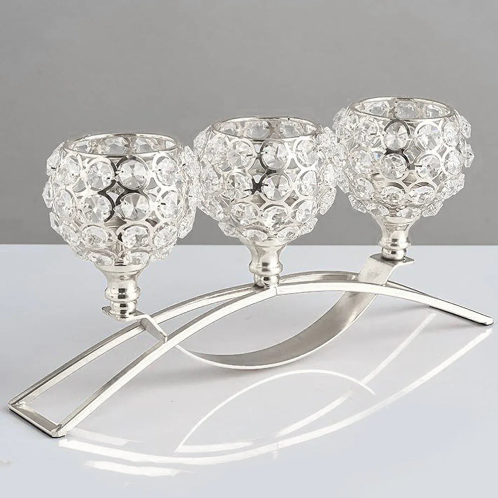 Geometric wrought iron candle holder with crystal centre in gold or silver electroplated finish