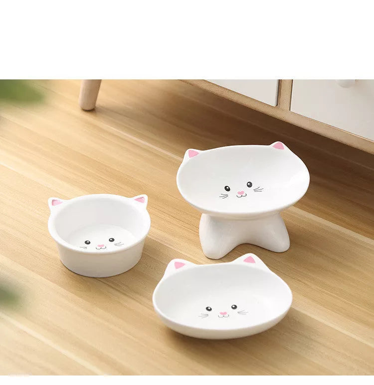 Ceramic pet food bowl with cat face design, easy to clean porcelain material