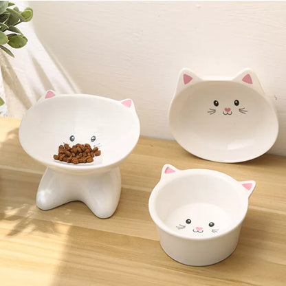Ceramic pet food bowl with cat face design, easy to clean porcelain material