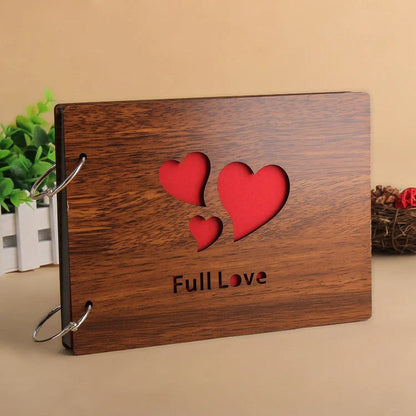 Handmade wooden photo album with customizable loose-leaf pages, 18 unique designs available