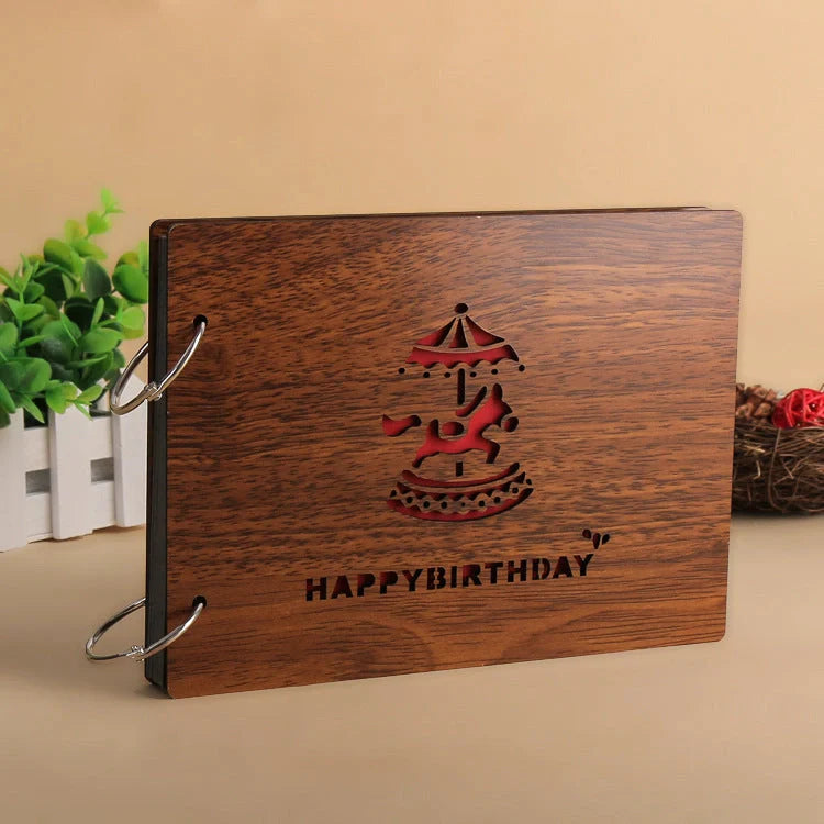 Handmade wooden photo album with customizable loose-leaf pages, 18 unique designs available