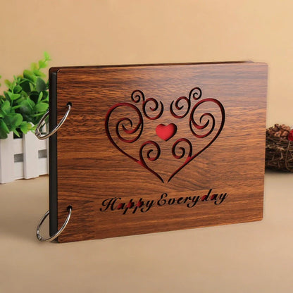 Handmade wooden photo album with customizable loose-leaf pages, 18 unique designs available