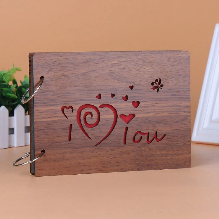Handmade wooden photo album with customizable loose-leaf pages, 18 unique designs available