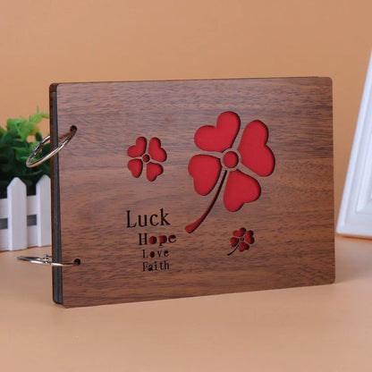 Handmade wooden photo album with customizable loose-leaf pages, 18 unique designs available
