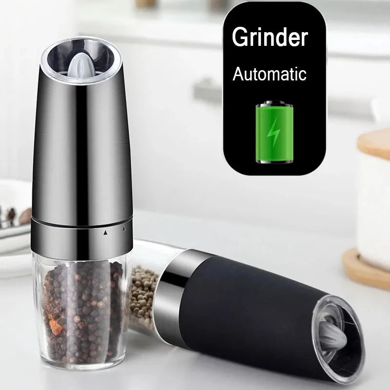 Modern electric gravity pepper grinder in matte black with adjustable ceramic mill and blue LED light on.
