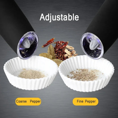 Modern electric gravity pepper grinder in matte black with adjustable ceramic mill and blue LED light on.