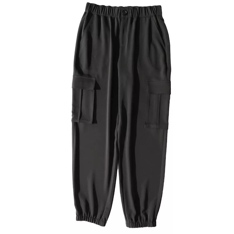 Women's elastic high waist cargo pants in black with multiple pockets