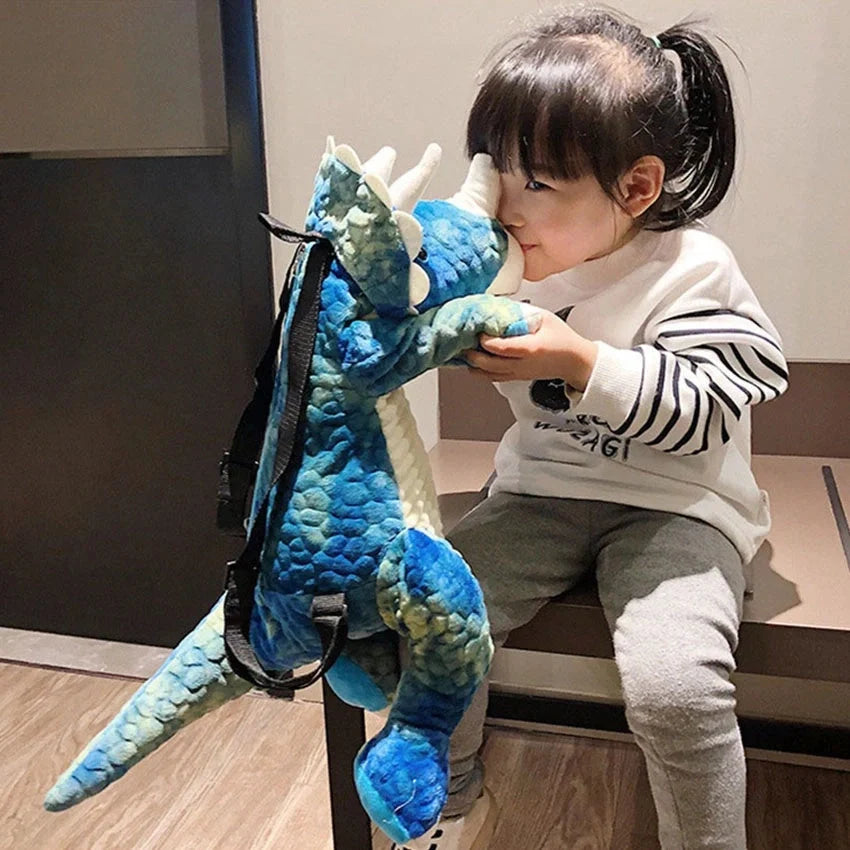 3D dinosaur plush backpack for kids in blue, red, brown, and green
