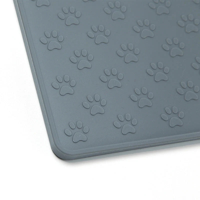 Waterproof silicone pet mat for dogs and cats, easy to clean and durable.