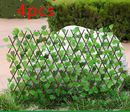 Plastic simulation wooden fence panel showing realistic wood grain texture in outdoor setting