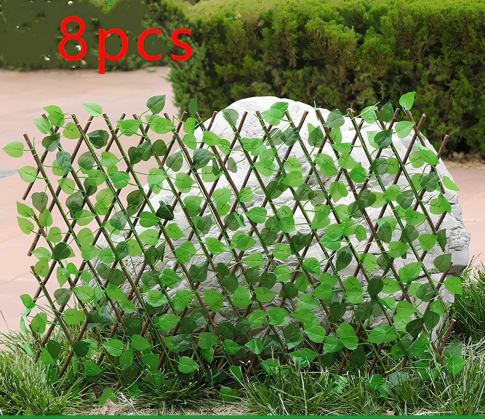 Plastic simulation wooden fence panel showing realistic wood grain texture in outdoor setting