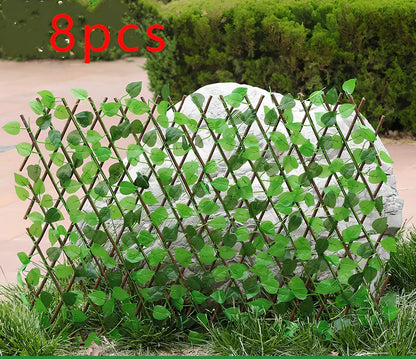 Plastic simulation wooden fence panel showing realistic wood grain texture in outdoor setting