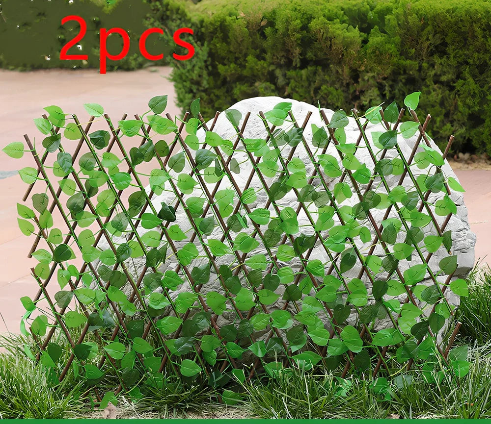 Plastic simulation wooden fence panel showing realistic wood grain texture in outdoor setting