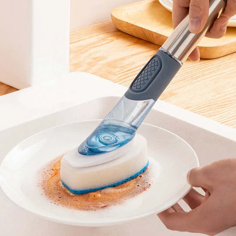Long-handled kitchen cleaning brush with a soap dispenser button and a blue sponge head