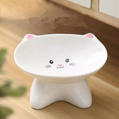 Ceramic pet food bowl with cat face design, easy to clean porcelain material