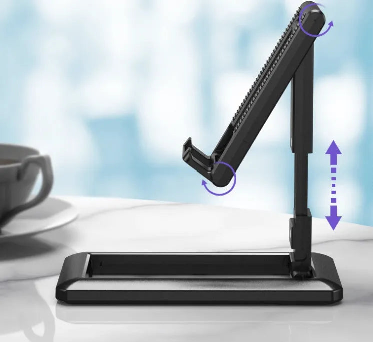 Retractable folding mobile phone stand in an adjusted position on a desktop, shown in one of four colour options.
