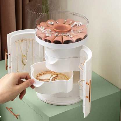 Elegant jewelry organizer with transparent cover, multi-level design, and customizable rotating base for storing and displaying jewelry