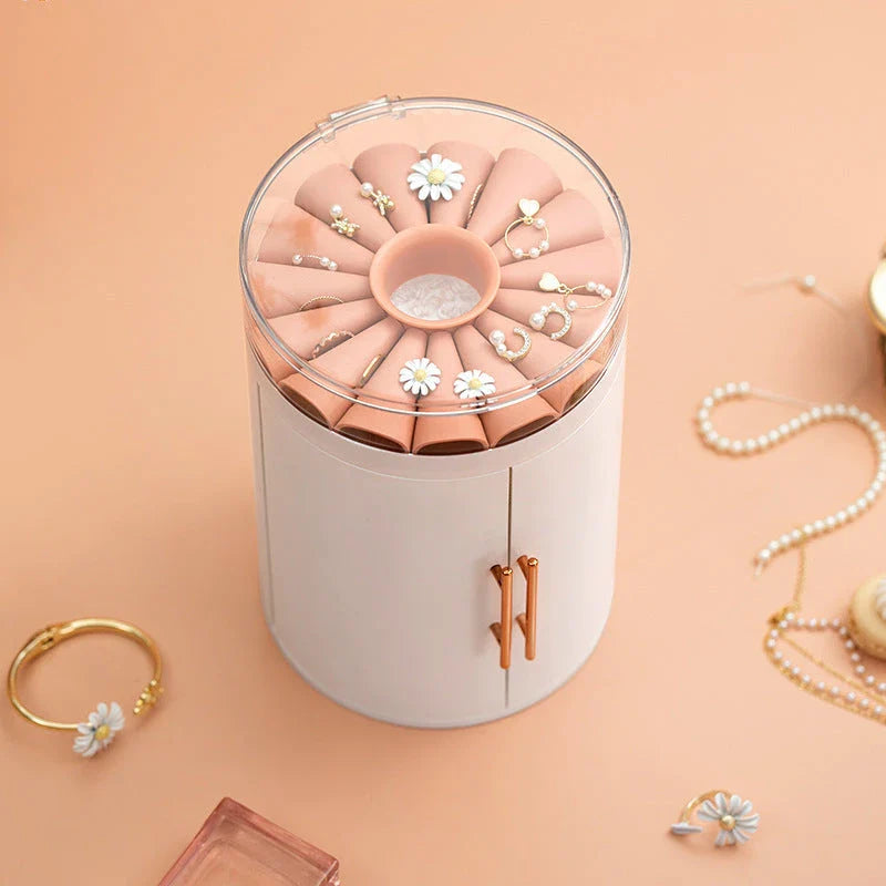 Elegant jewelry organizer with transparent cover, multi-level design, and customizable rotating base for storing and displaying jewelry