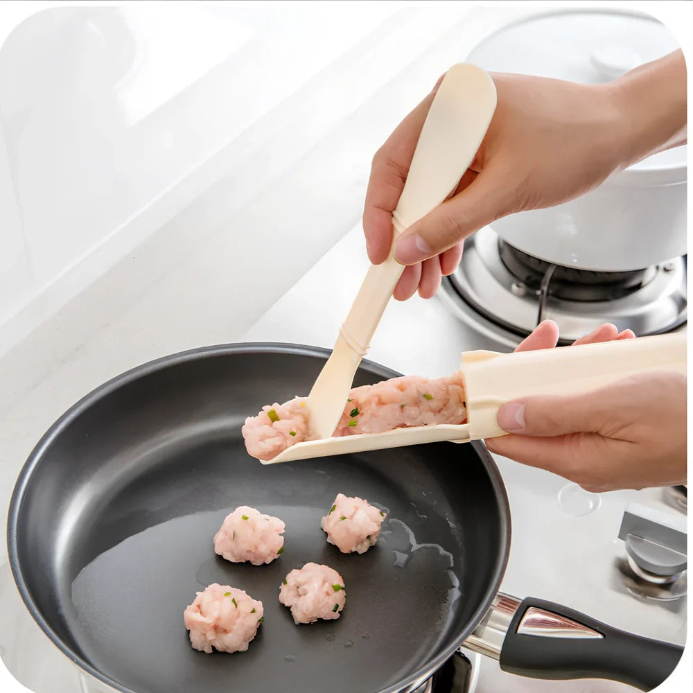 White plastic meatball maker tool showing 20cm diameter and 2.5cm meatball mould