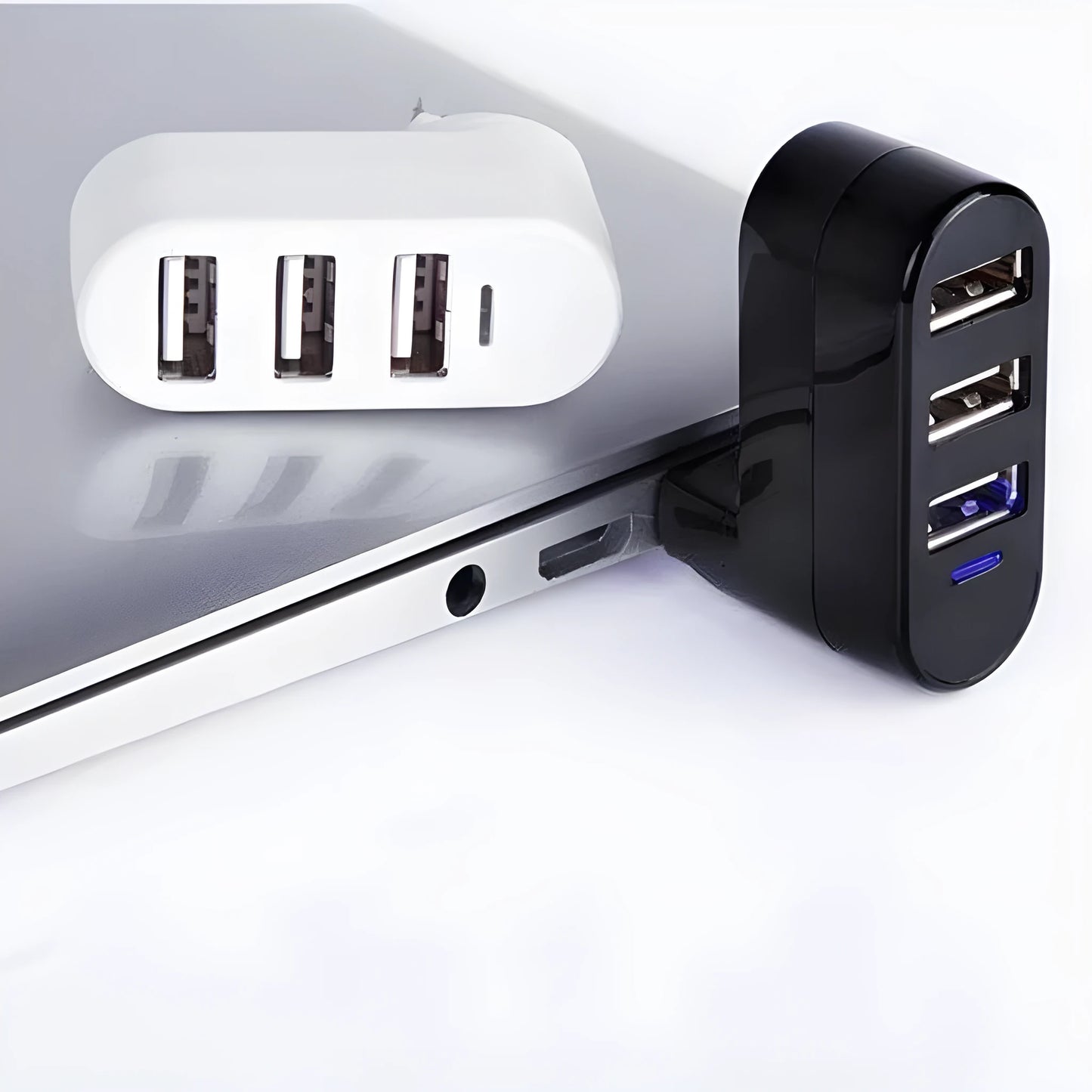 A black and a white USB 2.0 hub splitter with multiple ports.