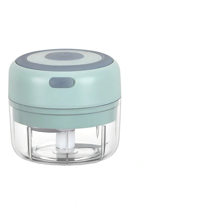 Mini electric garlic chopper with stainless steel blades in green, pink, or white with USB charging cable