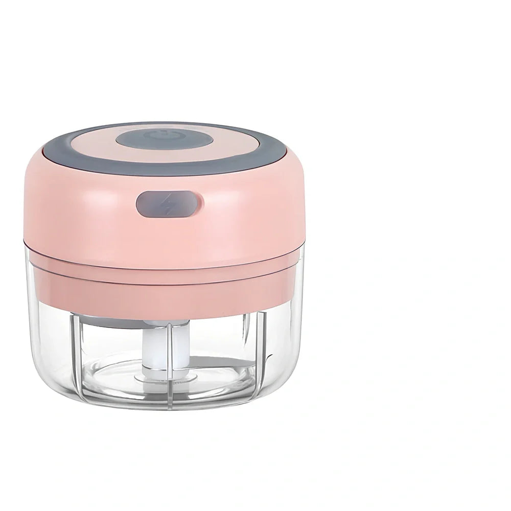 Mini electric garlic chopper with stainless steel blades in green, pink, or white with USB charging cable