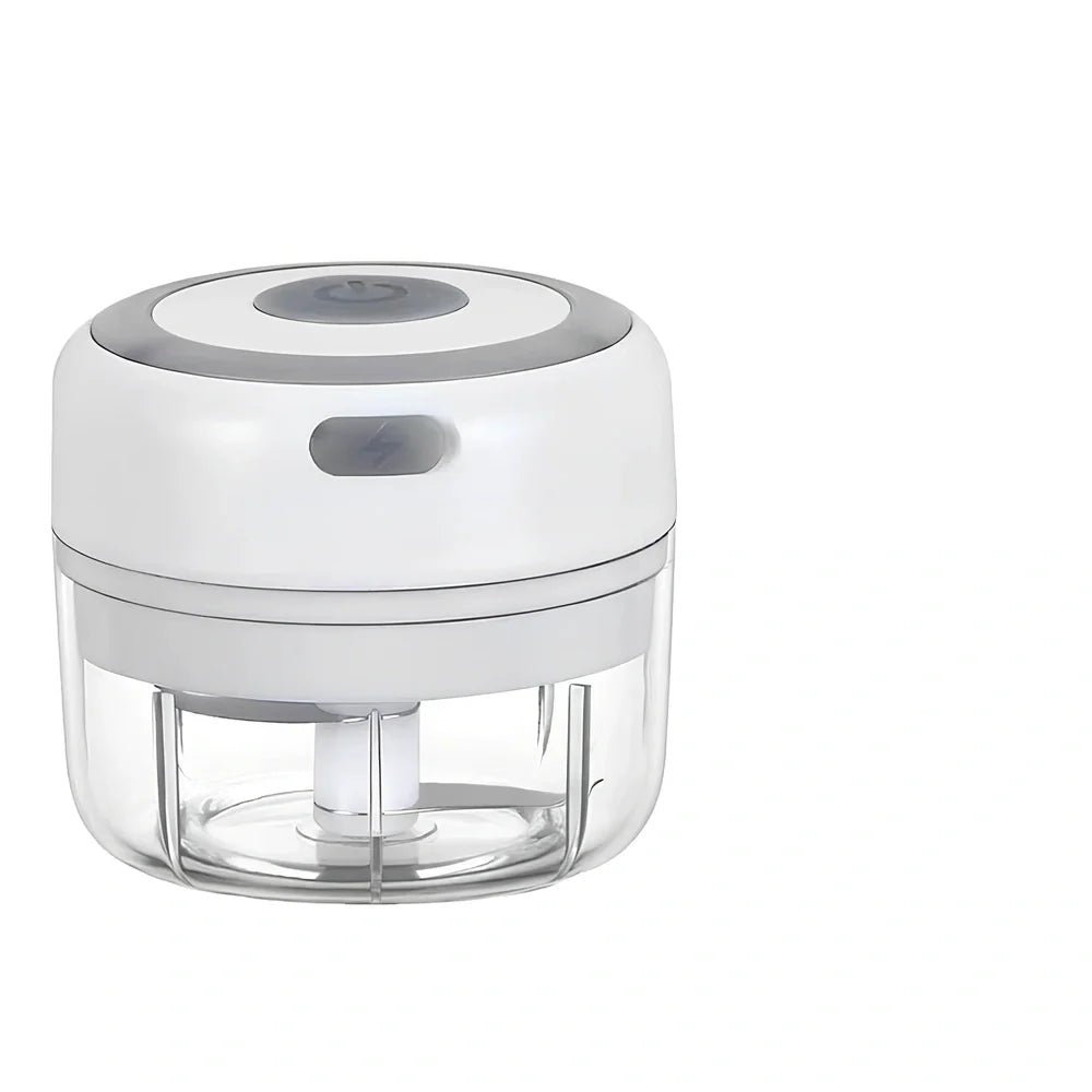 Mini electric garlic chopper with stainless steel blades in green, pink, or white with USB charging cable