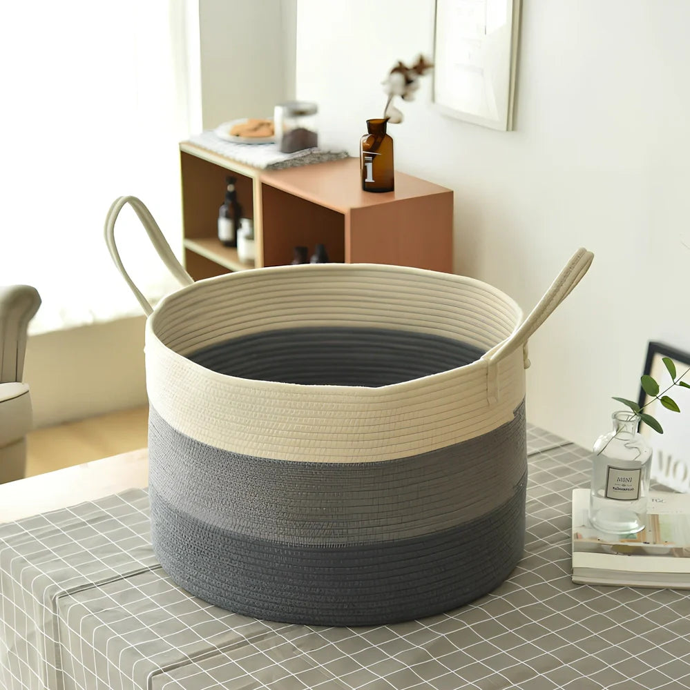Beige cotton rope storage basket with handles, 50cm wide, shown folded flat and upright with toys